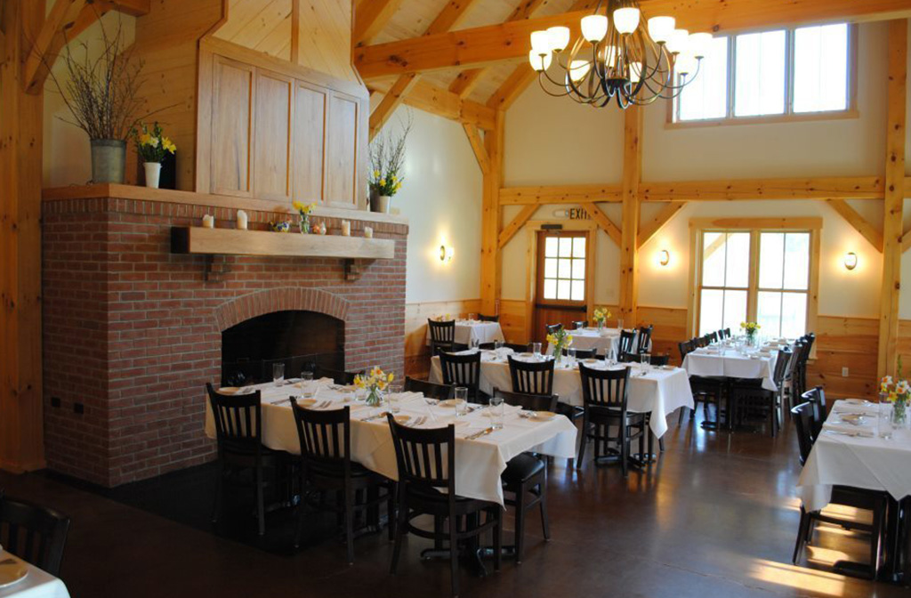 Finished interior of a timber frame restaurant with fancy table settings