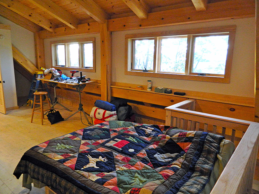 Bedroom in a timber frame camp