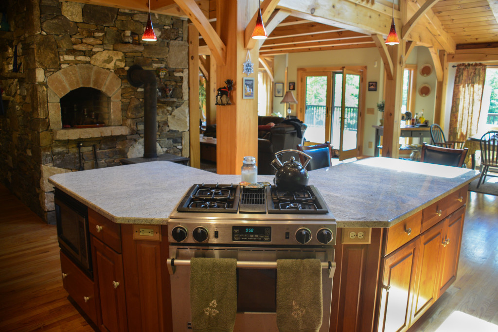 Kitchen island in a timber frame colonial