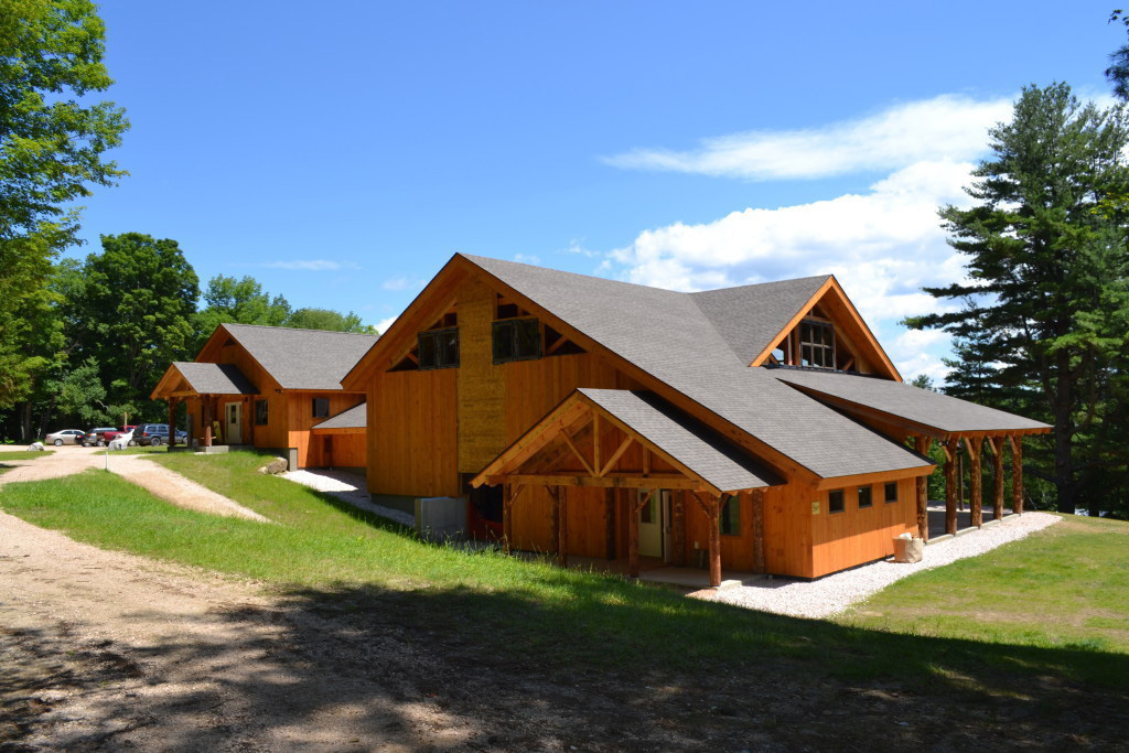 Finished exterior of a timber frame summer camp pavilion