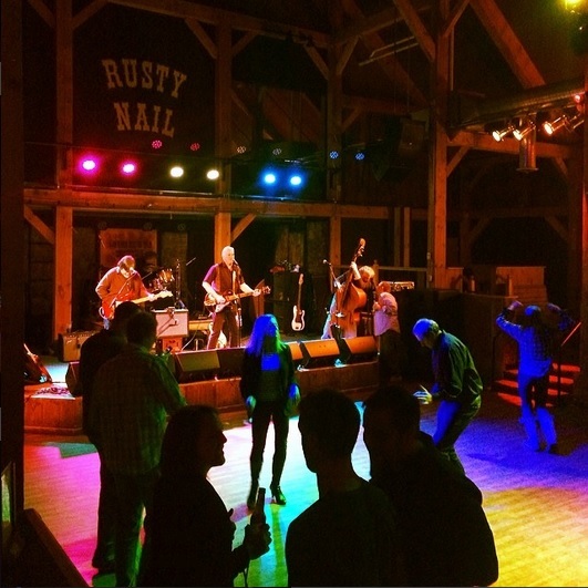 Timber frame interior of a music venue in Stowe